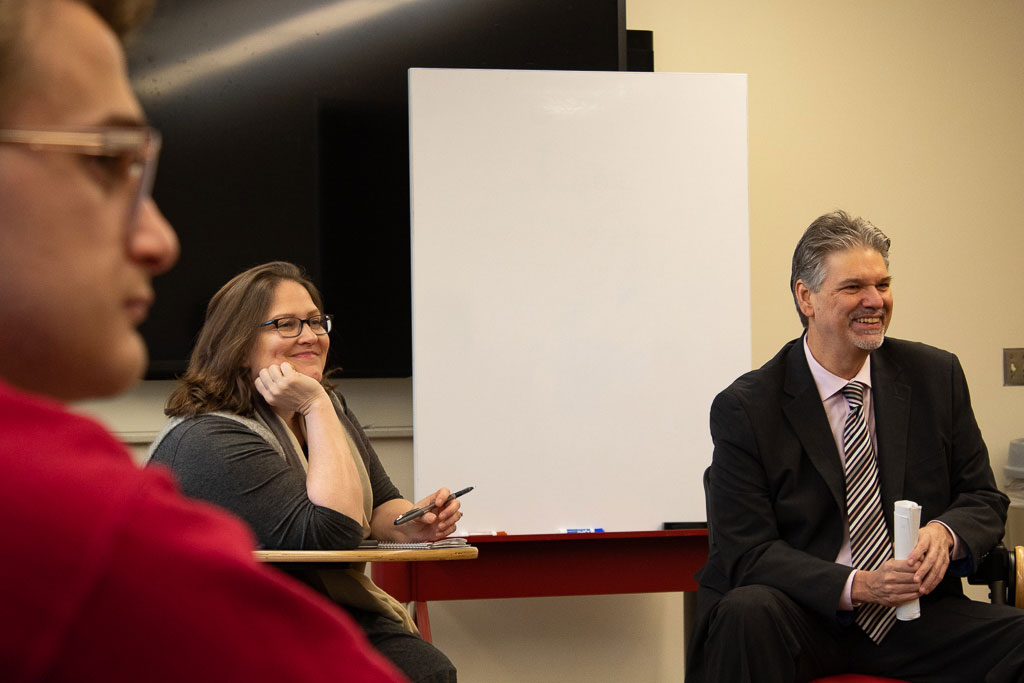 Kelley French speaks to students introducing a guest.